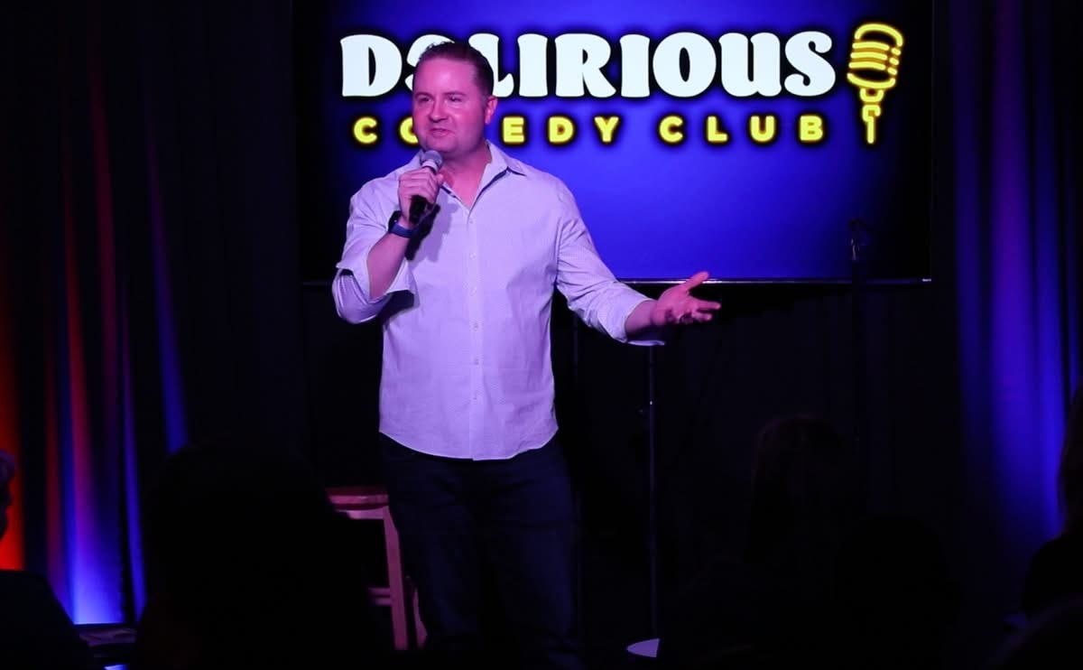 Brandon performing at Delirious Comedy Club
